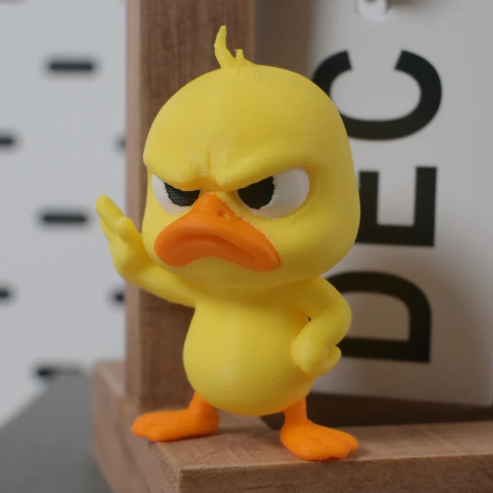 Angry Yellow Duck Statue with Rejecting Gesture. Funny Mini Figurine for Desk, Car, Home Decor. A Playful & Lightweight Gift.