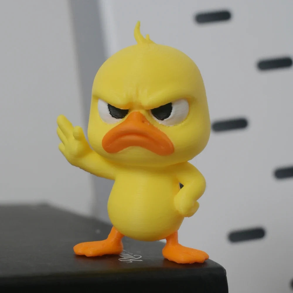 Angry Yellow Duck Statue with Rejecting Gesture. Funny Mini Figurine for Desk, Car, Home Decor. A Playful & Lightweight Gift.