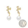 Crystal Bow and Pearl Dangle Earrings in Gold